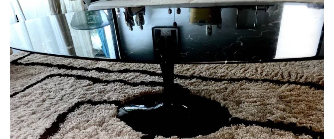 Table basse pied tulipe en marbre noir