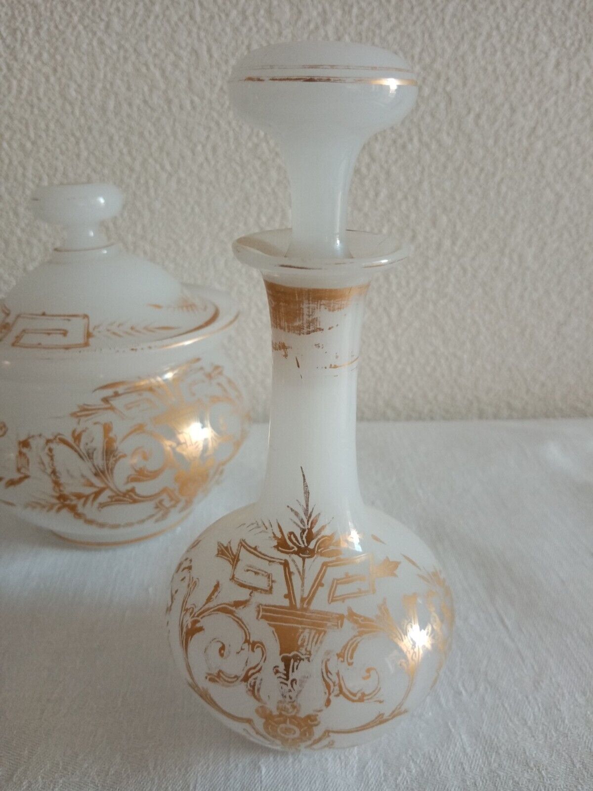 Suite Carafe, Carafon and Pot Opaline with gilded decorations XIX th