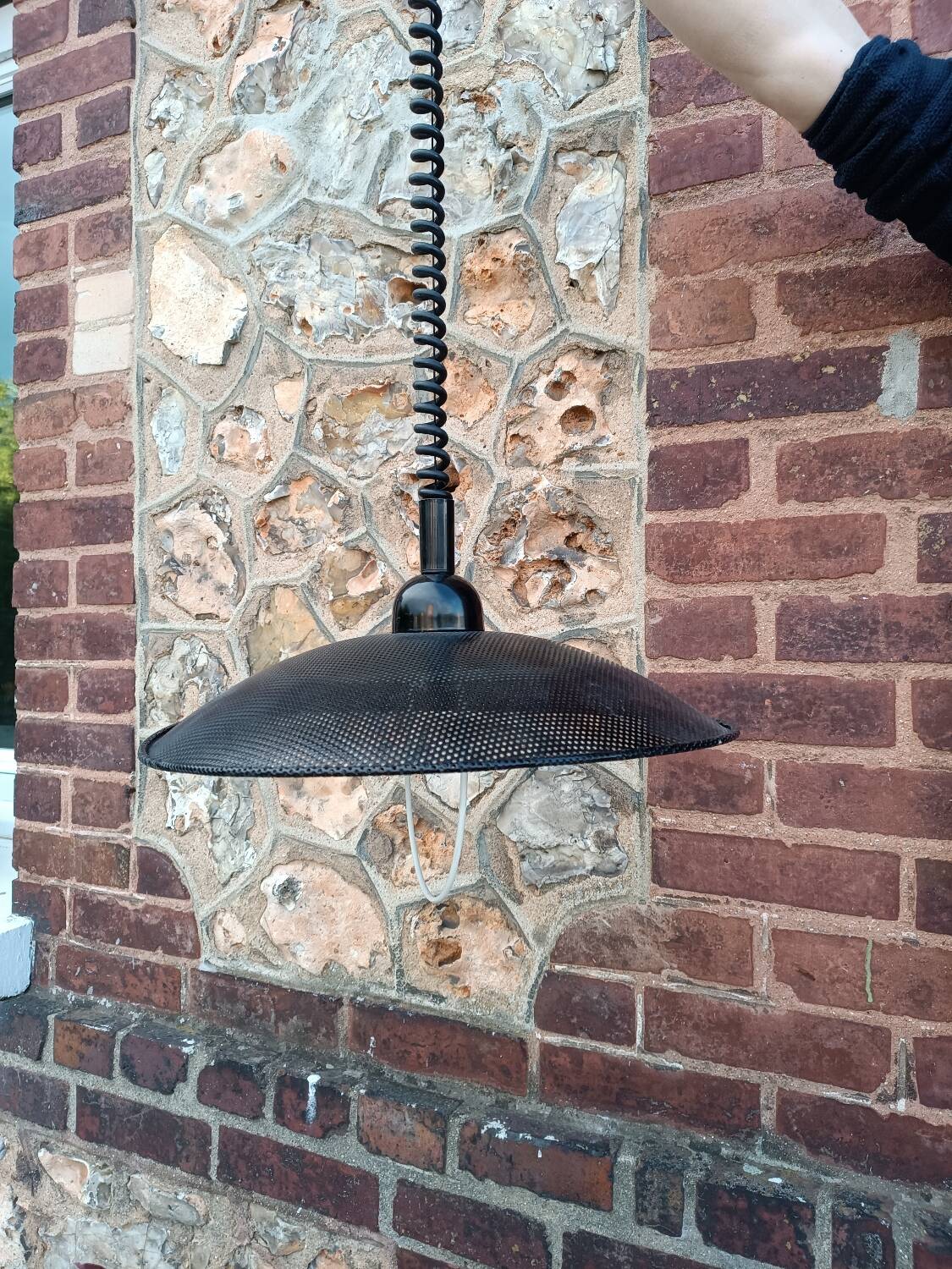 Scandinavian pendant light in perforated sheet metal