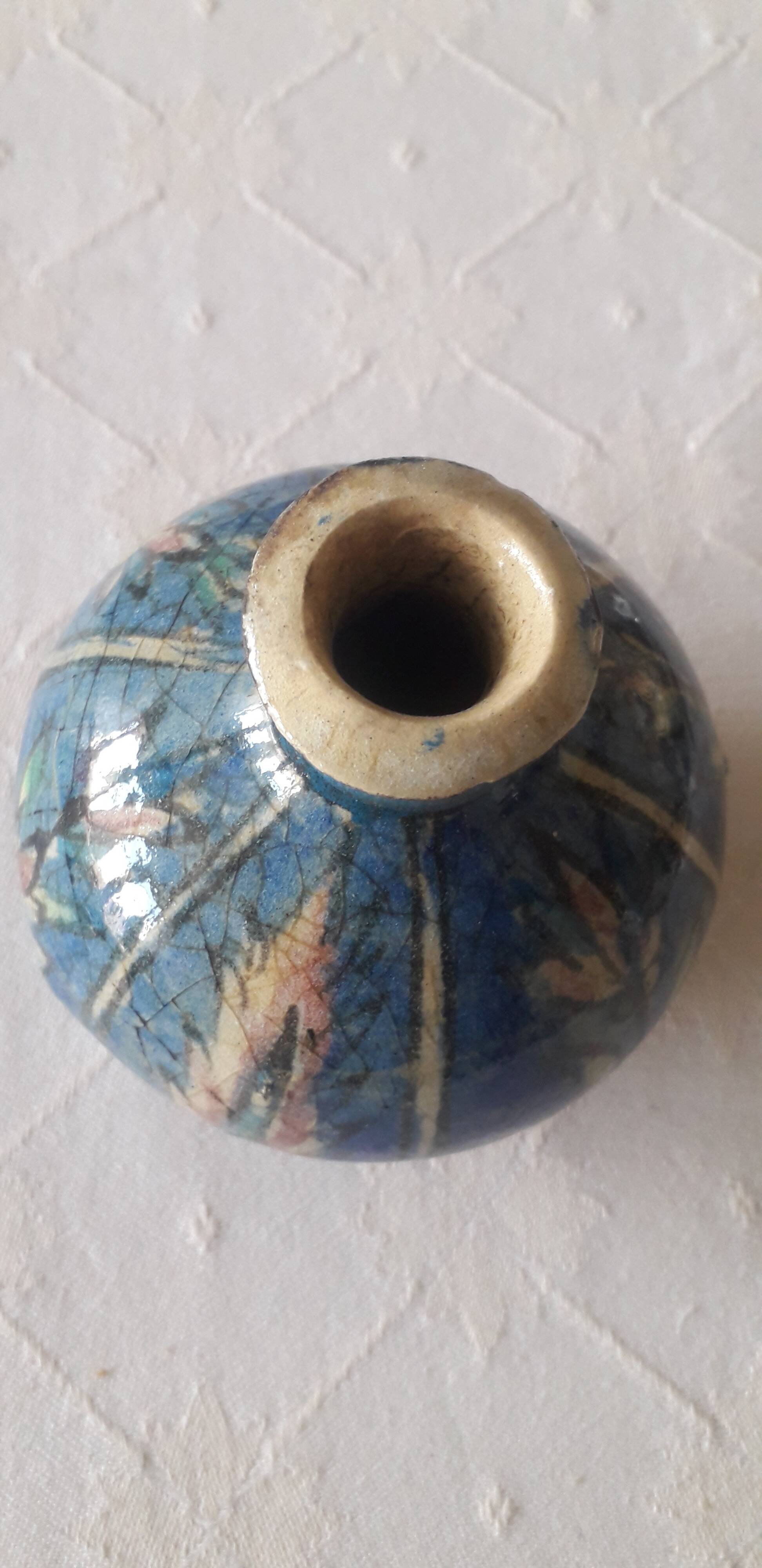 A very original antique vase with a floral design.