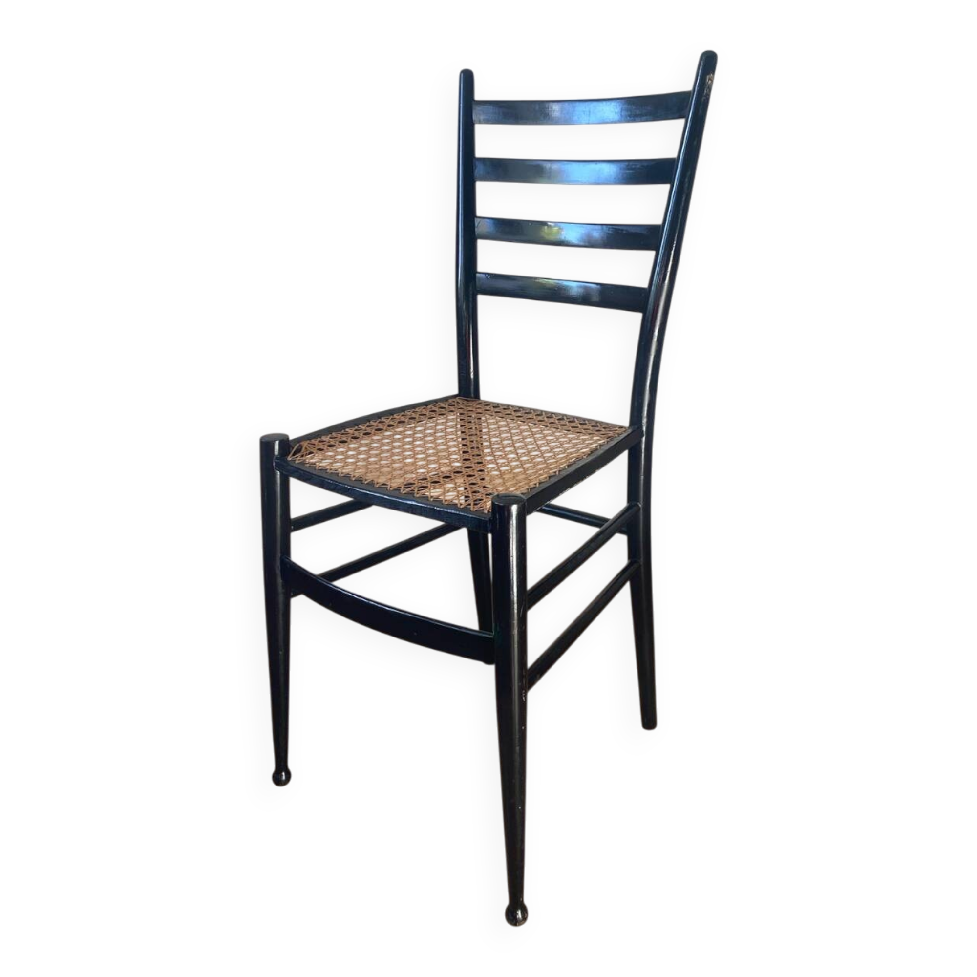 Light wooden chair with caning