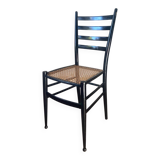 Light wooden chair with caning