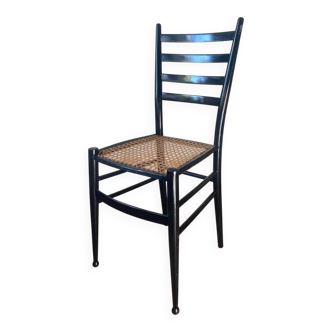 Light wooden chair with caning