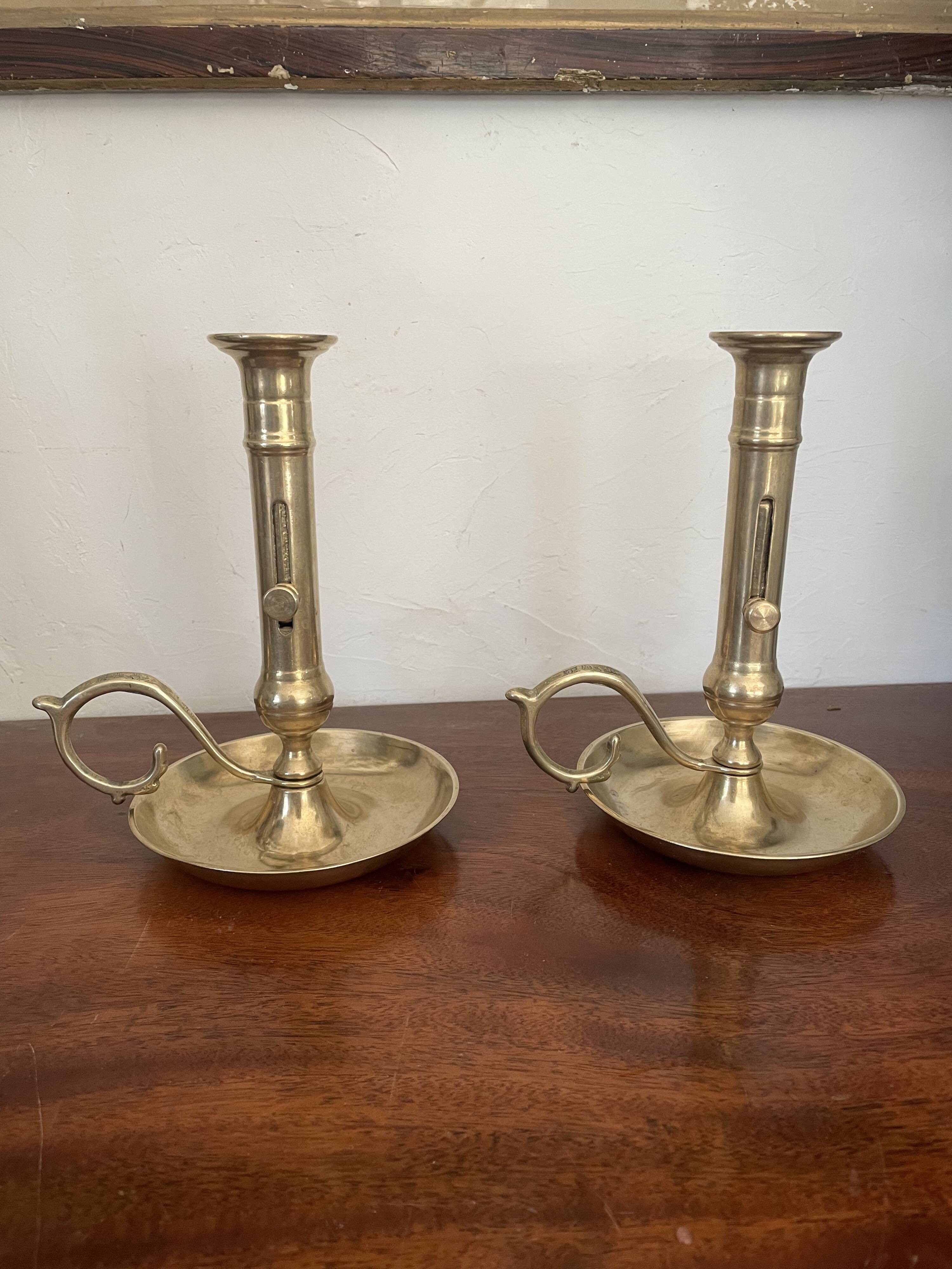 Pair of brass candle holders