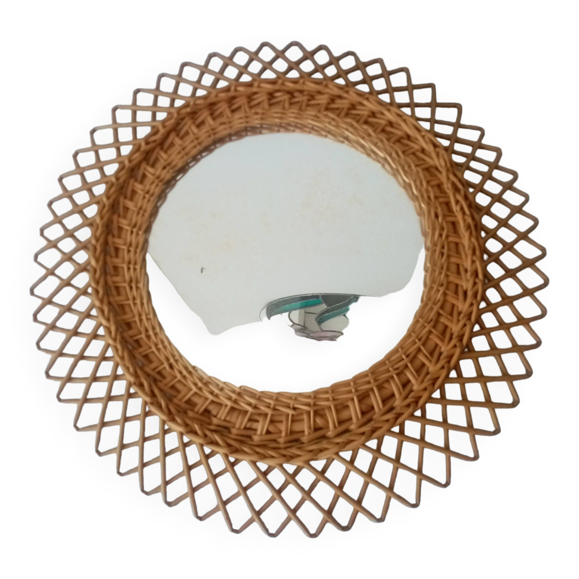 Old vintage sun mirror in rattan braid 60 years