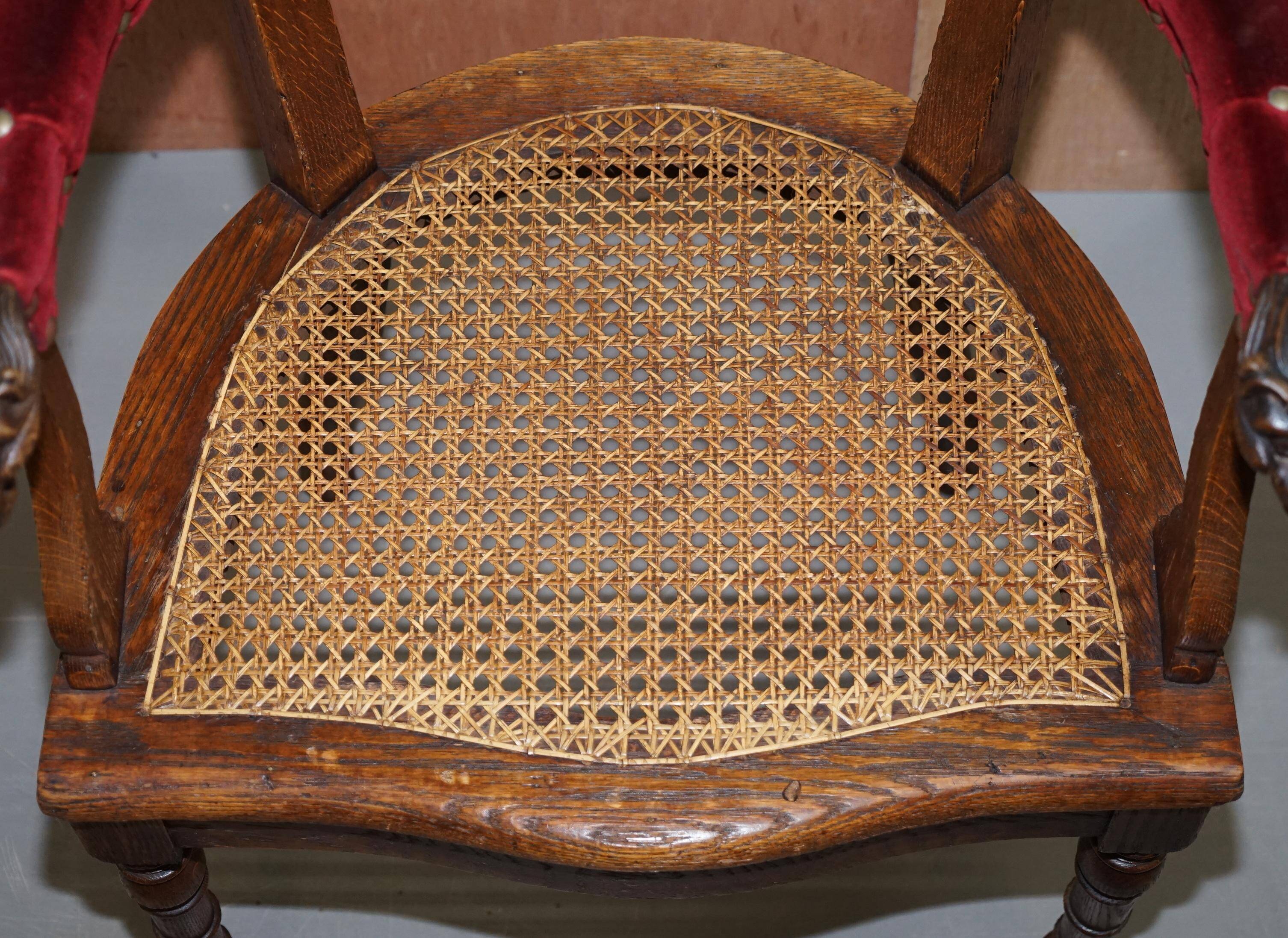 Antique Régence Bergère Armchair in Carved Oak with Lion Head Armrests