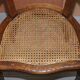 Antique Régence Bergère Armchair in Carved Oak with Lion Head Armrests