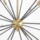 Sputnik-shaped chandelier in patinated gold-plated brass and black lacquer. Contemporary.