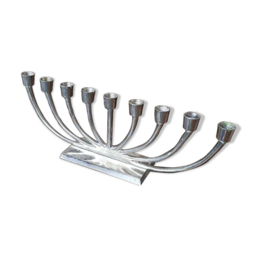Large modern chrome metal candlestick for Hanukkah.