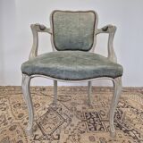 Louis XV style cabriolet armchair in patinated wood and velvet