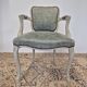 Louis XV style cabriolet armchair in patinated wood and velvet
