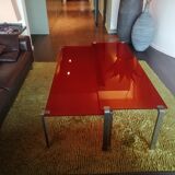 Red glass trundle coffee table by Jean Nouvel edited by Zeritalia