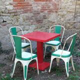 Four old Tolix Model A chairs