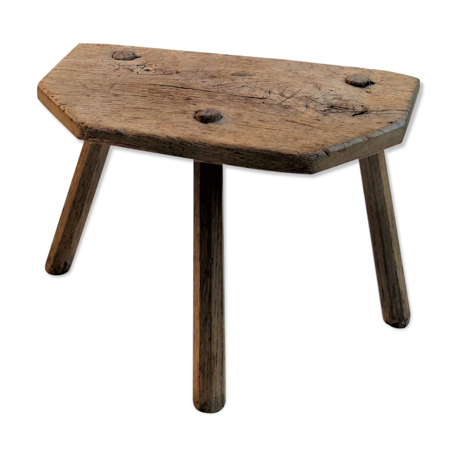 Old wooden milking stool