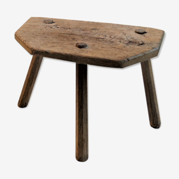 Old wooden milking stool
