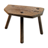 Old wooden milking stool