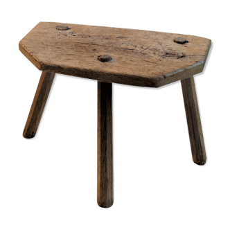 Old wooden milking stool