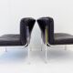 Eurochair set of 2 black leather lounge chairs by Girsberger