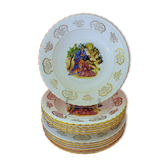 Suite of twelve plates: six table plates and six soup plates.