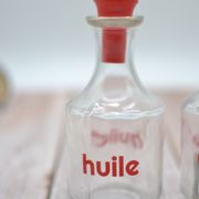 Oil and vinegar with red writing