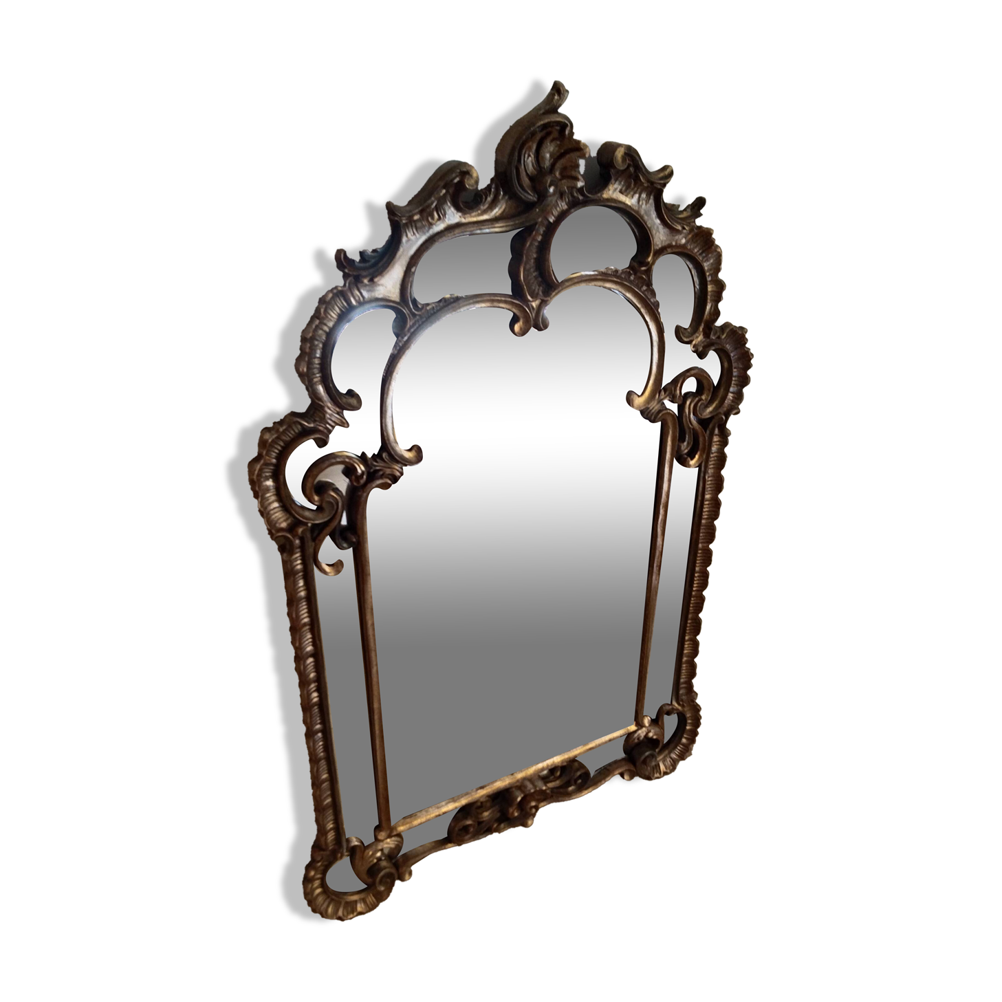 Antique mirror with rococo-style pareclose, in gilded wood, 19th century