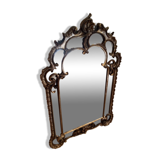 Antique mirror with rococo-style pareclose, in gilded wood, 19th century