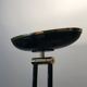 Black lacquered metal floor lamp with brass.