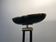 Black lacquered metal floor lamp with brass.