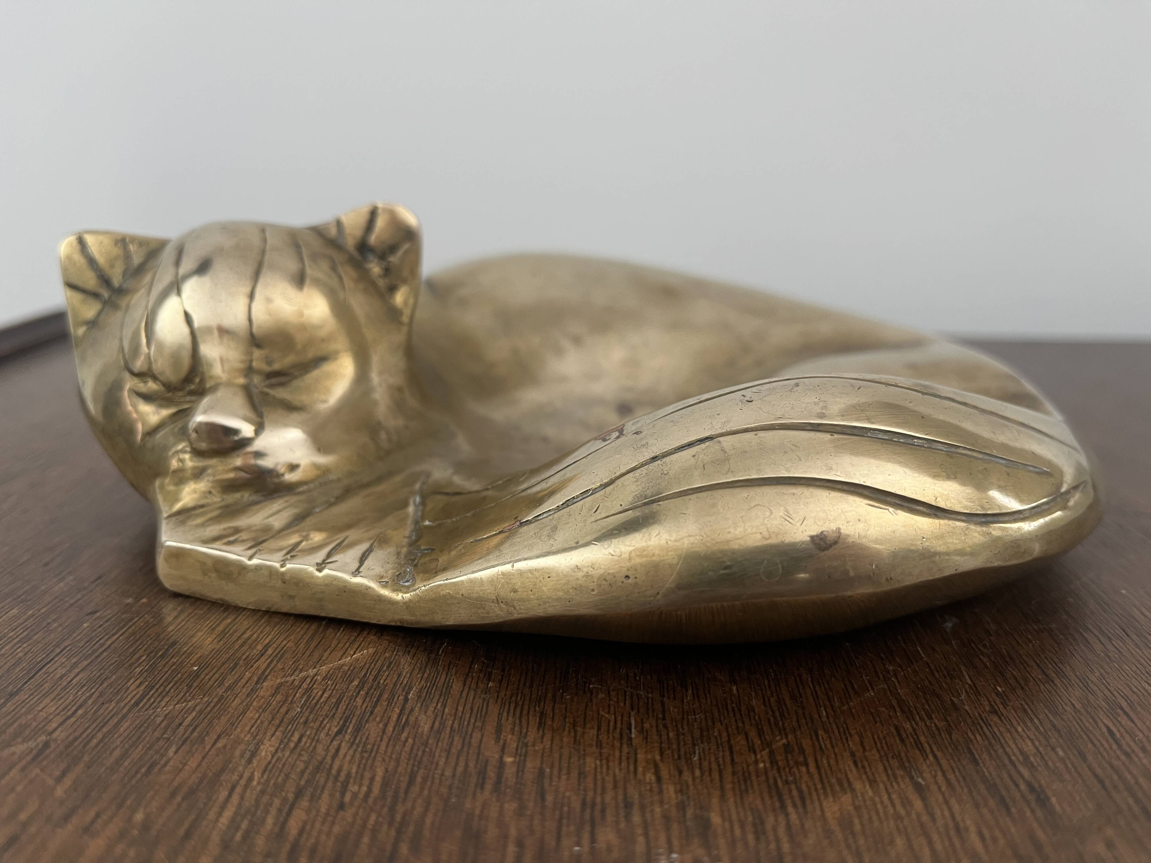 bronze cat emptier from the 1930s