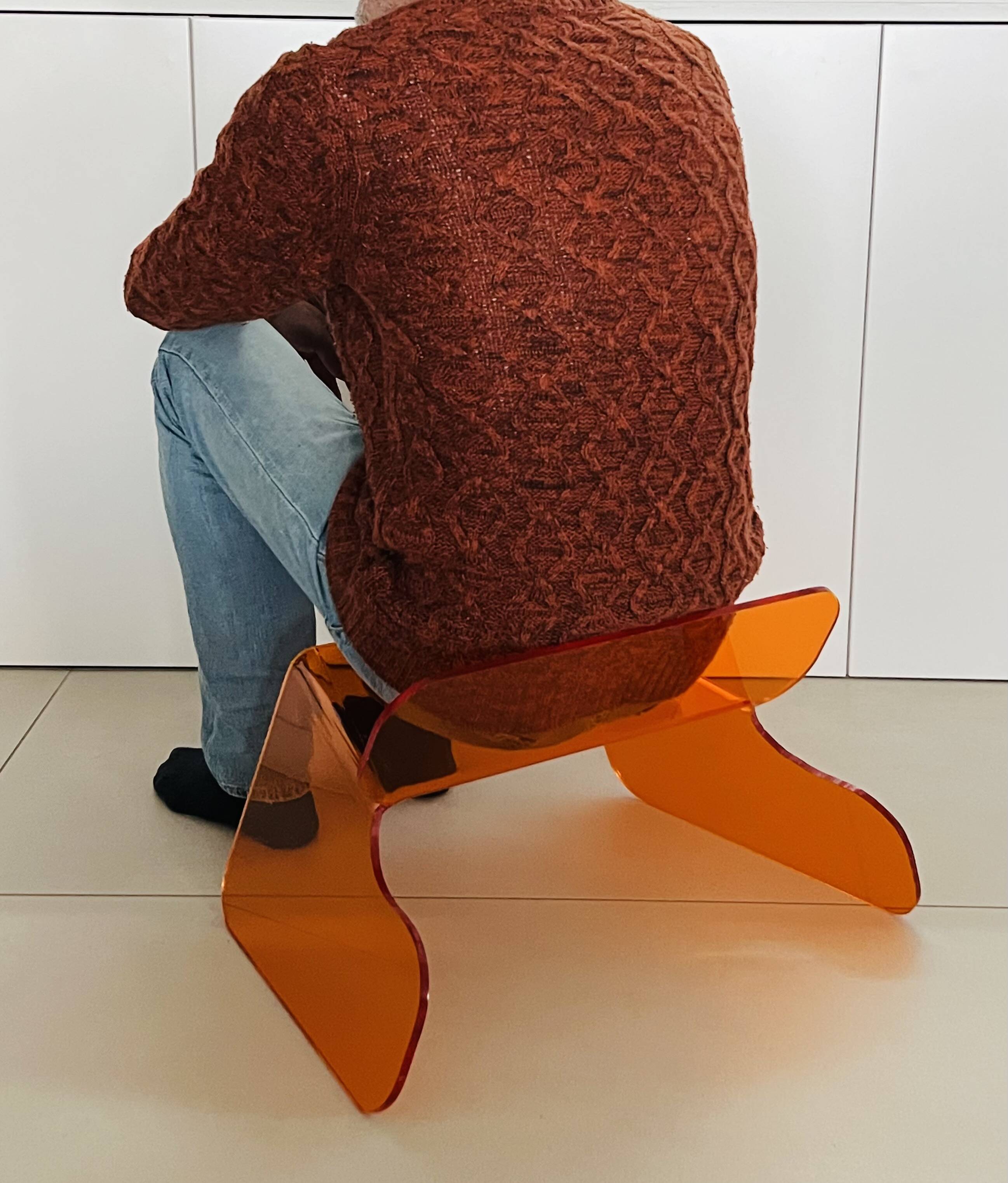 Orange plexiglass chair, 1970s France.