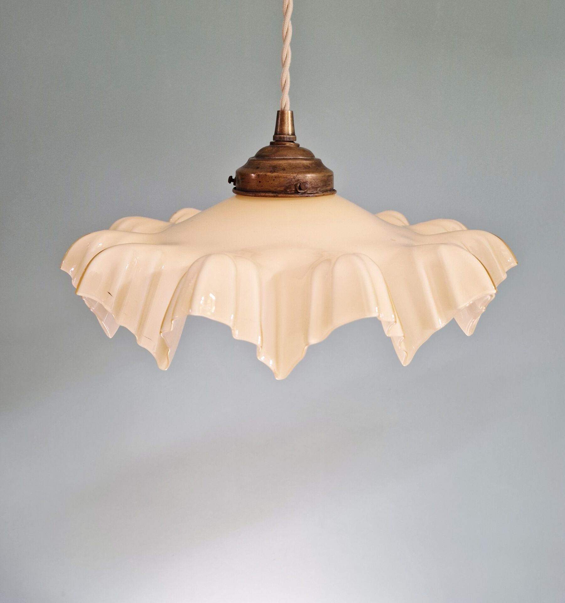 Art Deco trio of suspensions in coloured frilled opaline, 1920-30.
