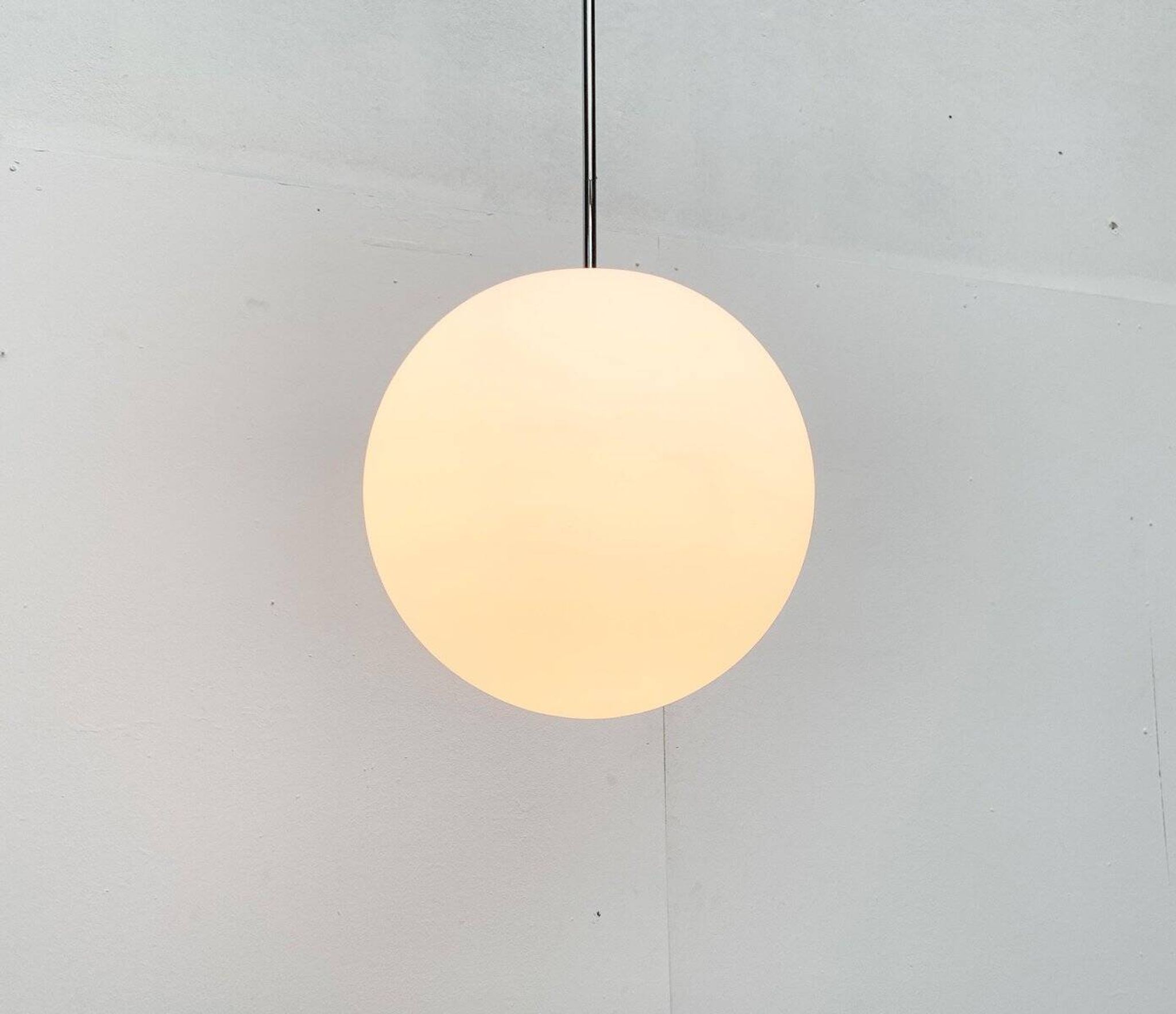 Vintage German space age glass ball pendant lamp by Limburg.