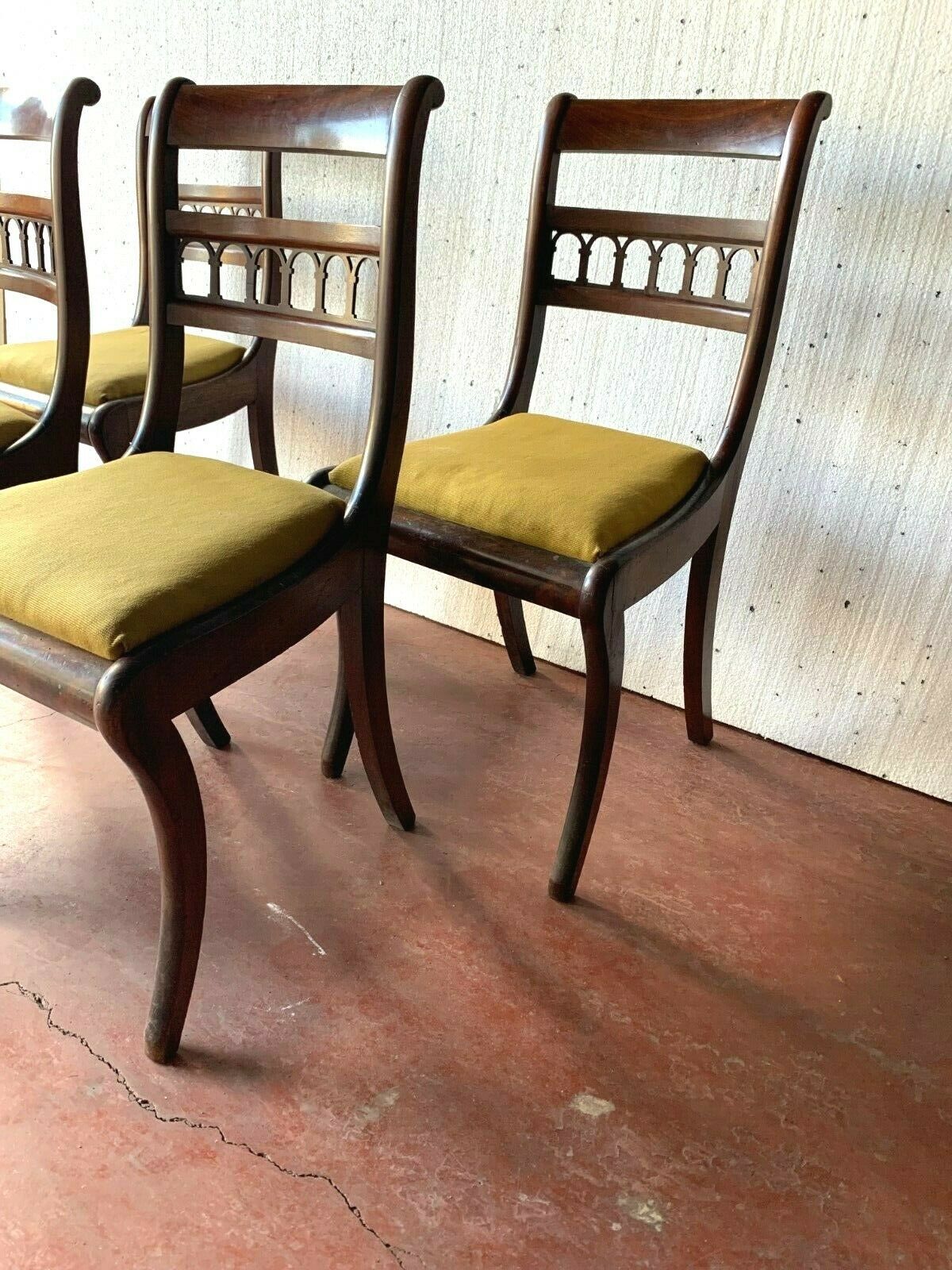 Four 2th century mahogany board-style chairs