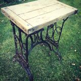Established solid wood and cast iron console