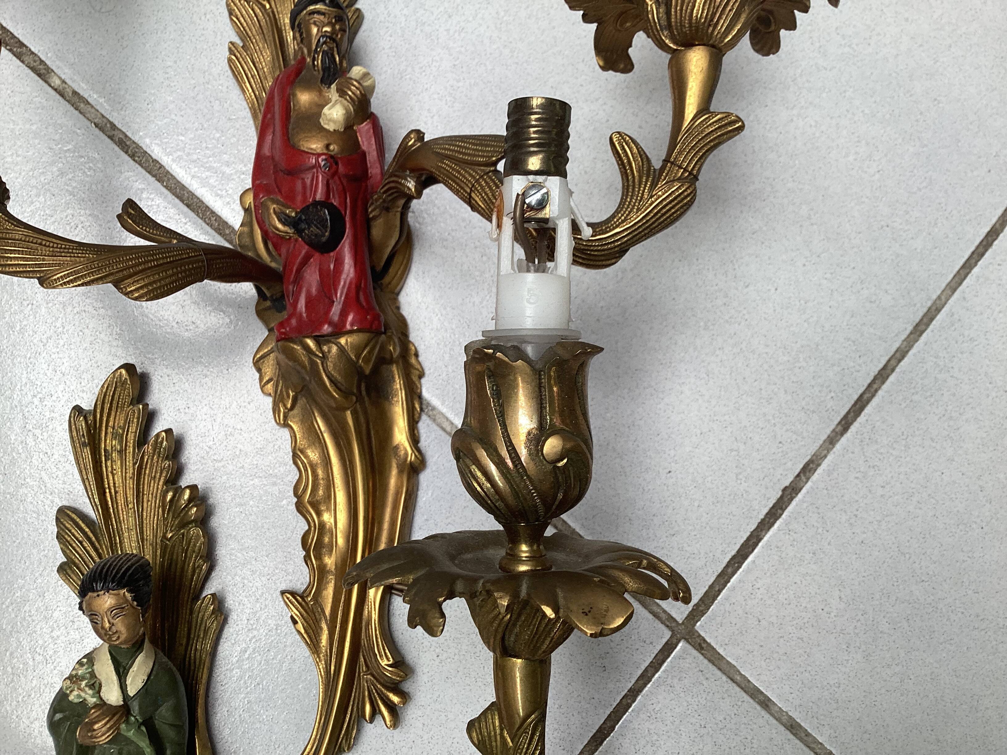 Pair of Chinese bronze wall sconces from the 19th century.