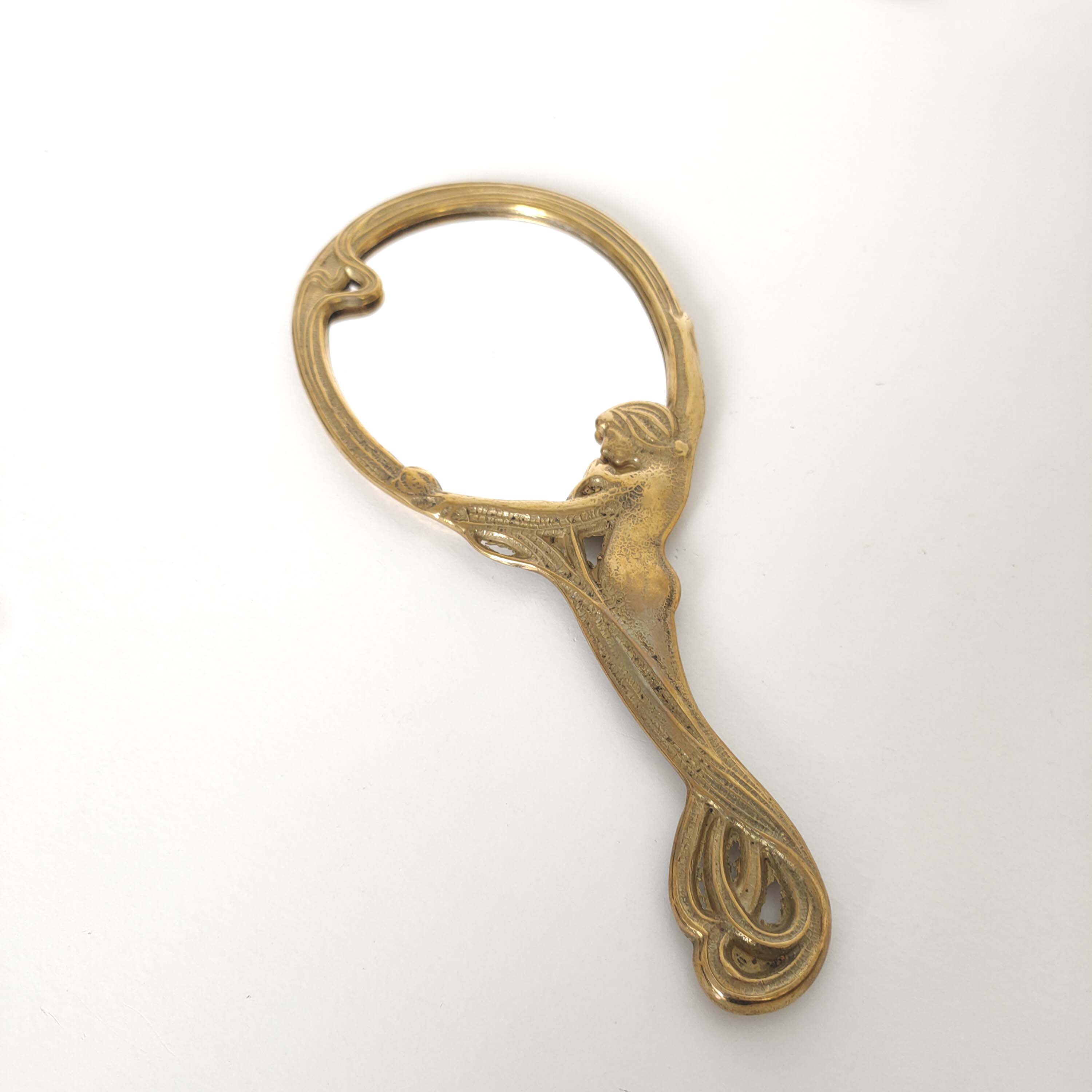 Brass hand mirror