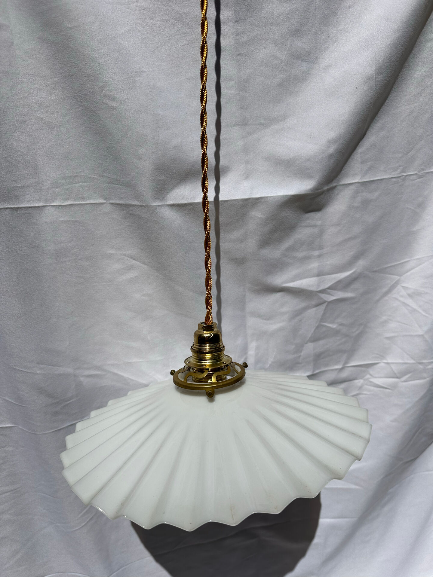 Vintage suspension opaline pleated lampshade with golden threads and claw socket.