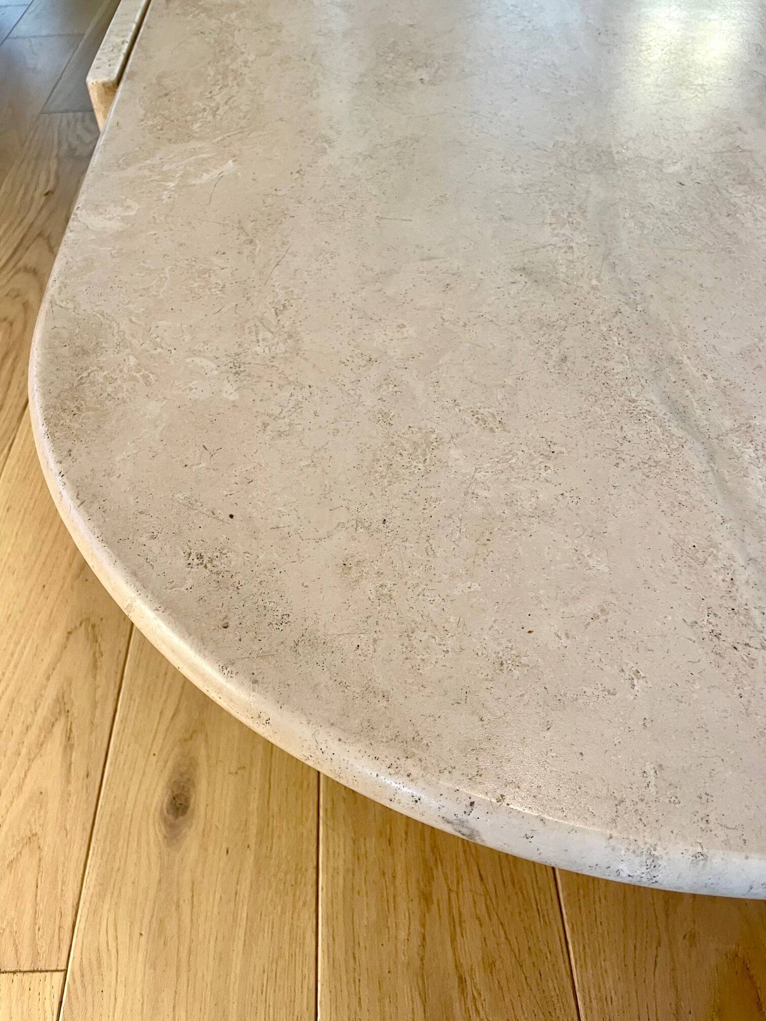 Roche Bobois “eye” travertine table