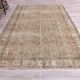 Tapis vintage en laine et coton beige au design floral