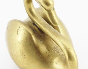 Brass swan statue