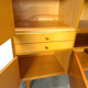 Vintage wooden sideboard with sliding glass doors and drawers