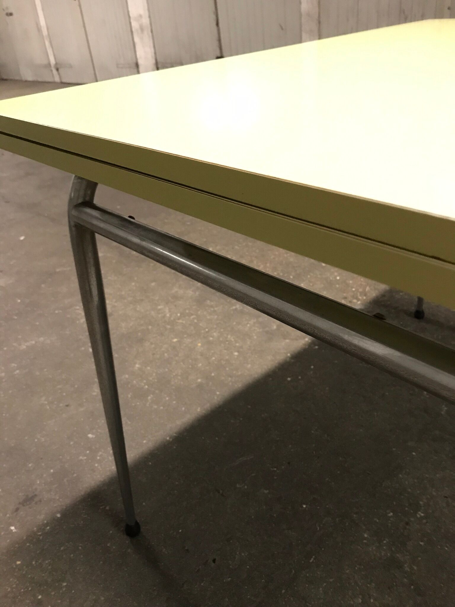 Yellow formica kitchen table with two extension cord, vintage 60s