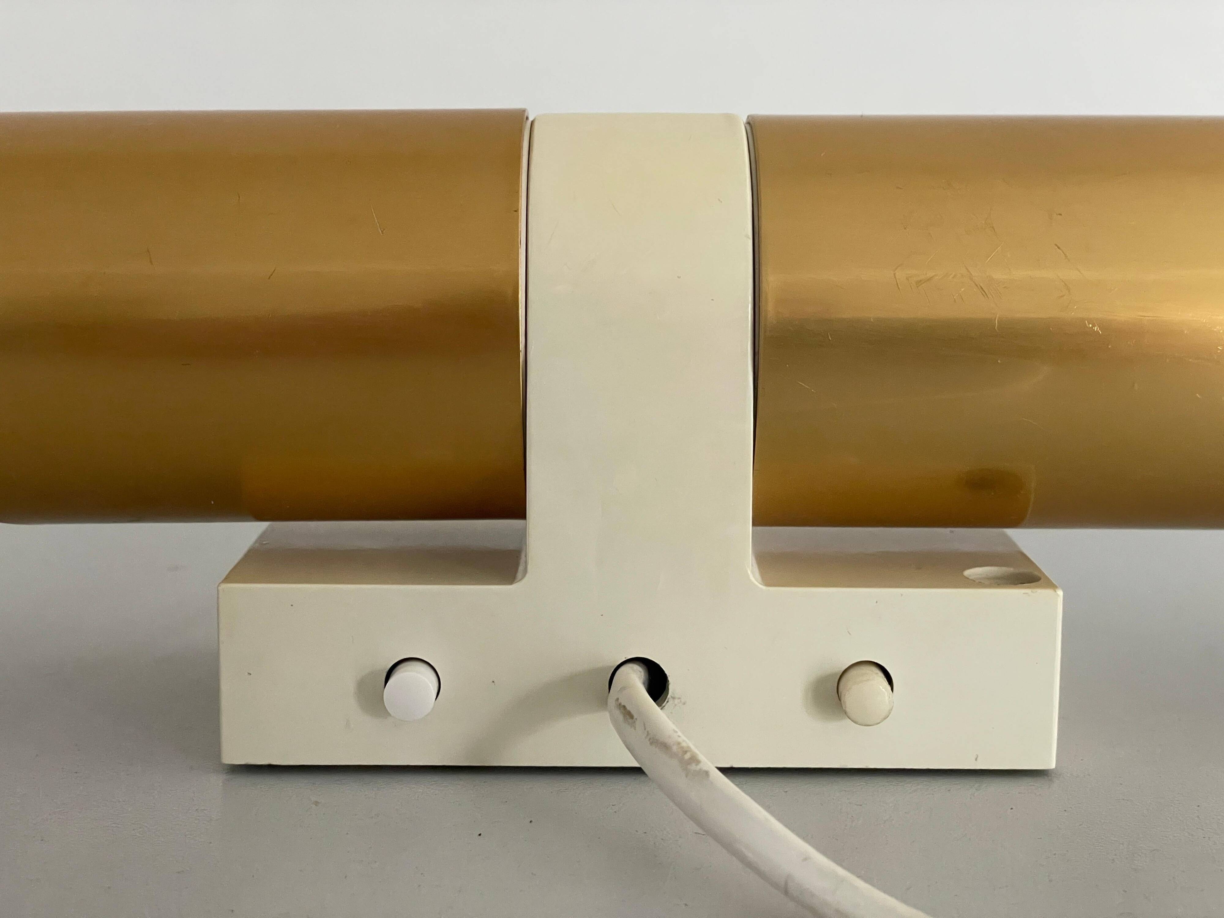 Pair of two-headed wall sconces in gold metal by ERCO, 1970s, Germany