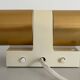 Pair of two-headed wall sconces in gold metal by ERCO, 1970s, Germany