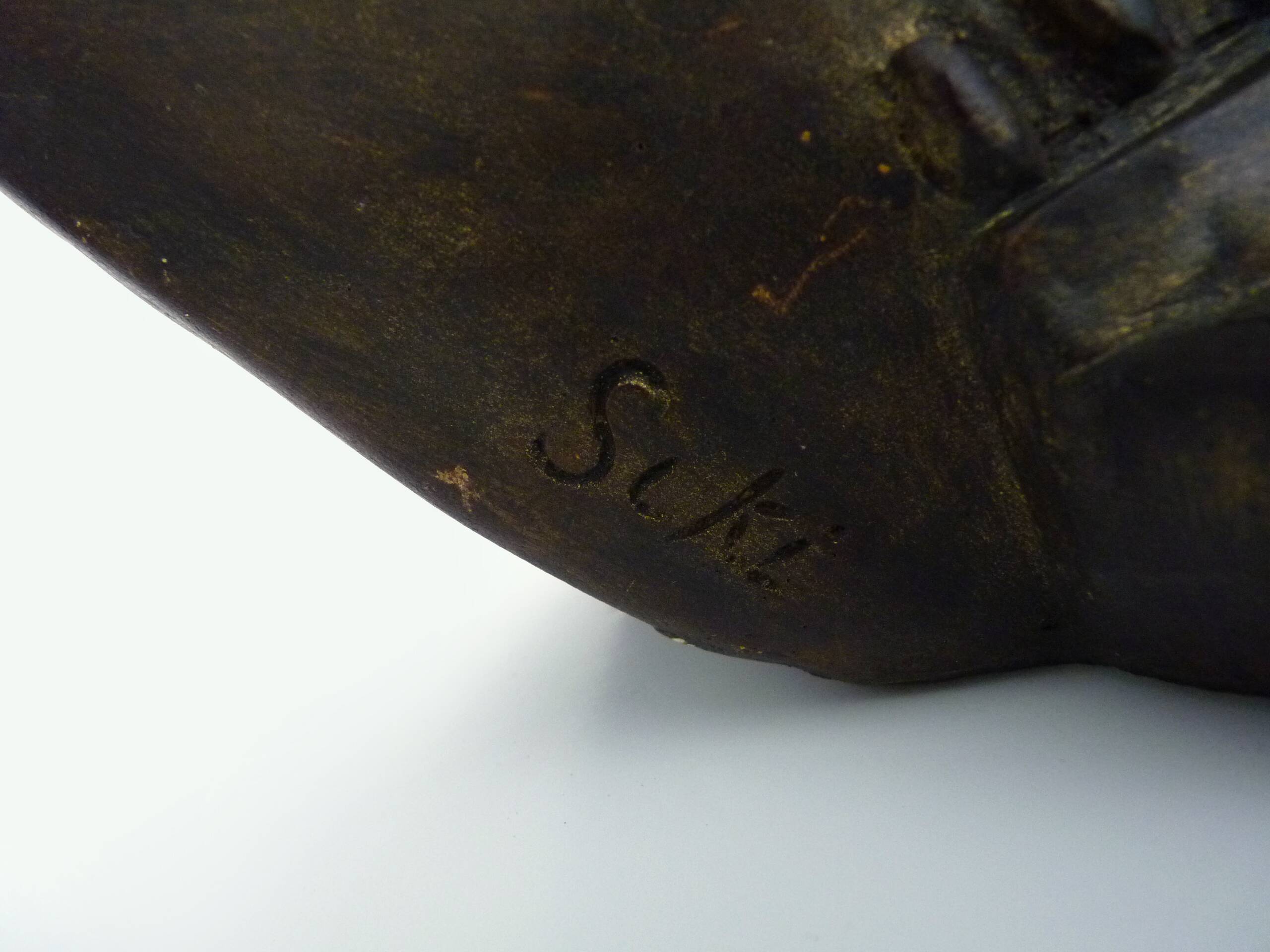 African style terracotta mask signed Siki