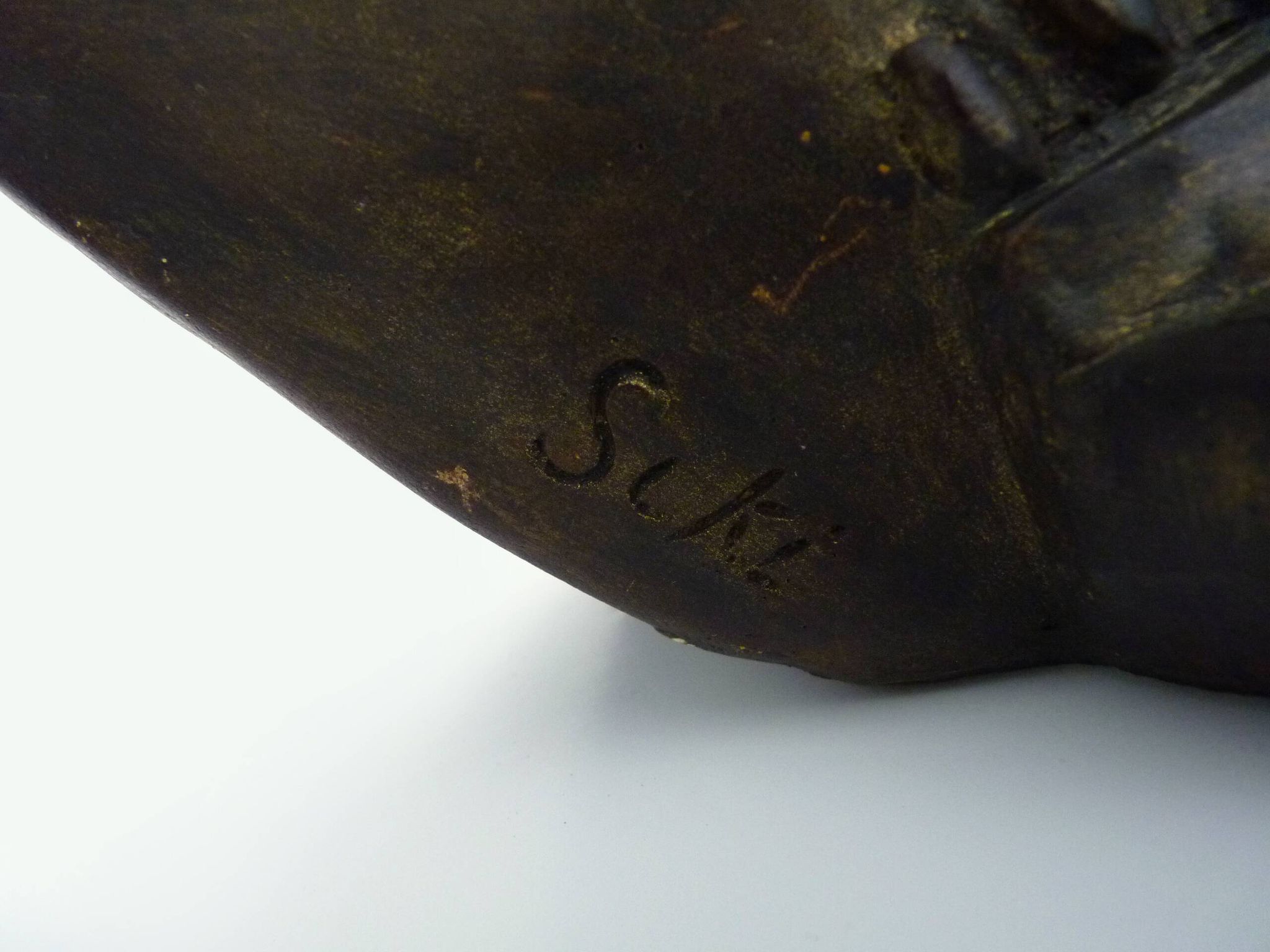 African style terracotta mask signed Siki