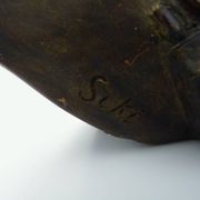African style terracotta mask signed Siki