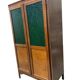 Vintage wooden display cabinet with green glass.