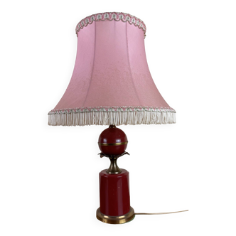 Art deco style desk lamp with a burgundy red sphere in the center the body is in lacquered iron