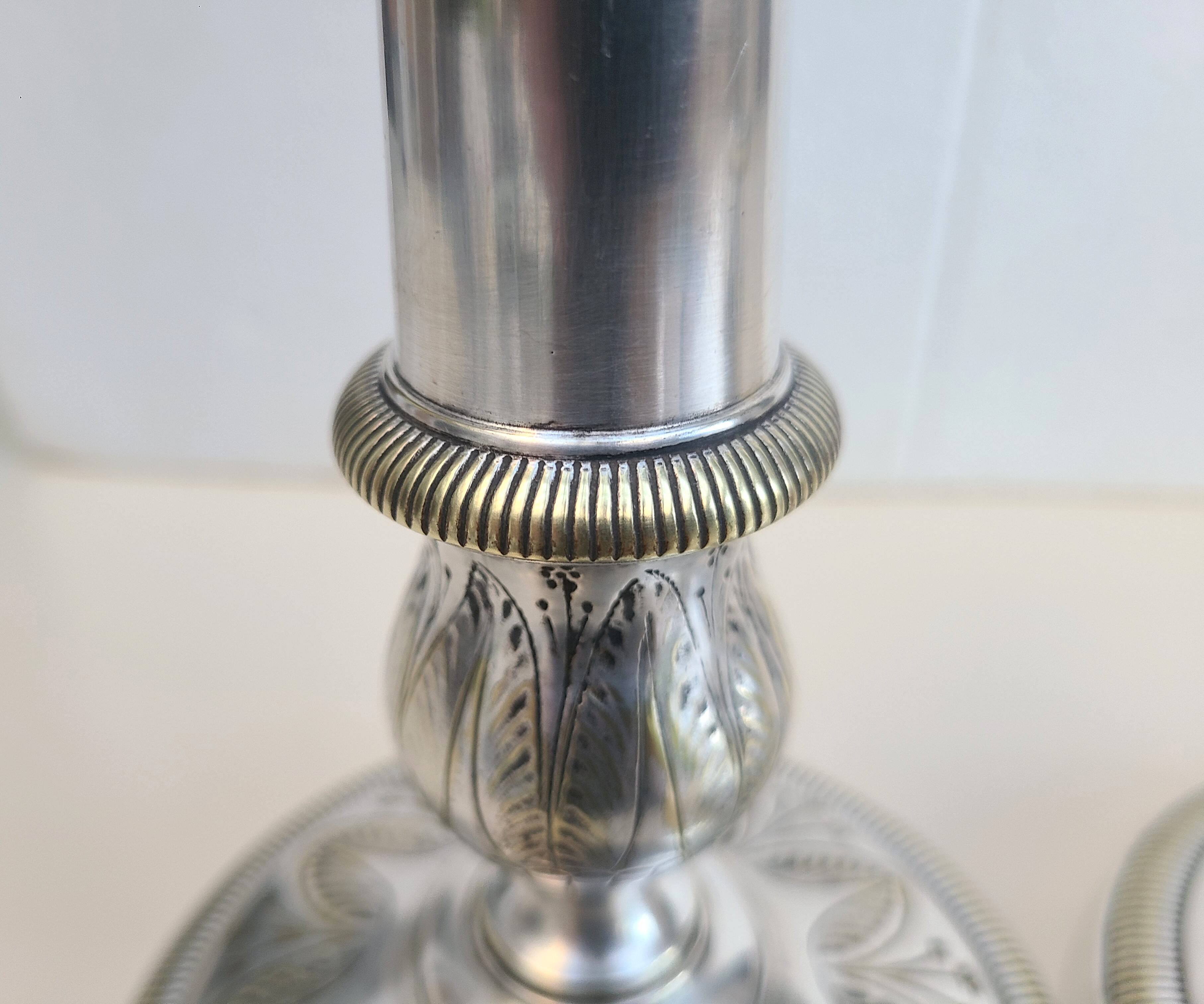 Antique silver-plated metal candlesticks